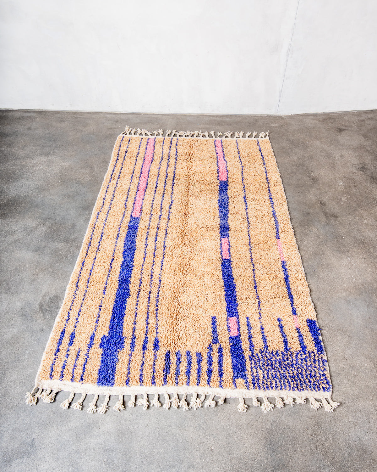 Modern, designer, handcrafted Berber rug from Morocco. Beniourain carpet with beautiful colours and patterns and fluffy wool texture.